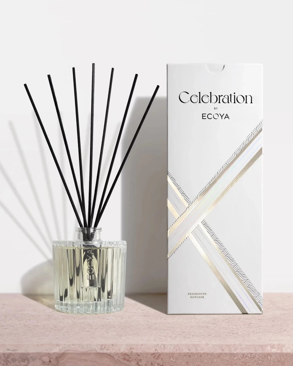 200ml Celebration Diffuser in deco-inspired cut glass vessel with seven black reed sticks, offering up to six months of fragrance